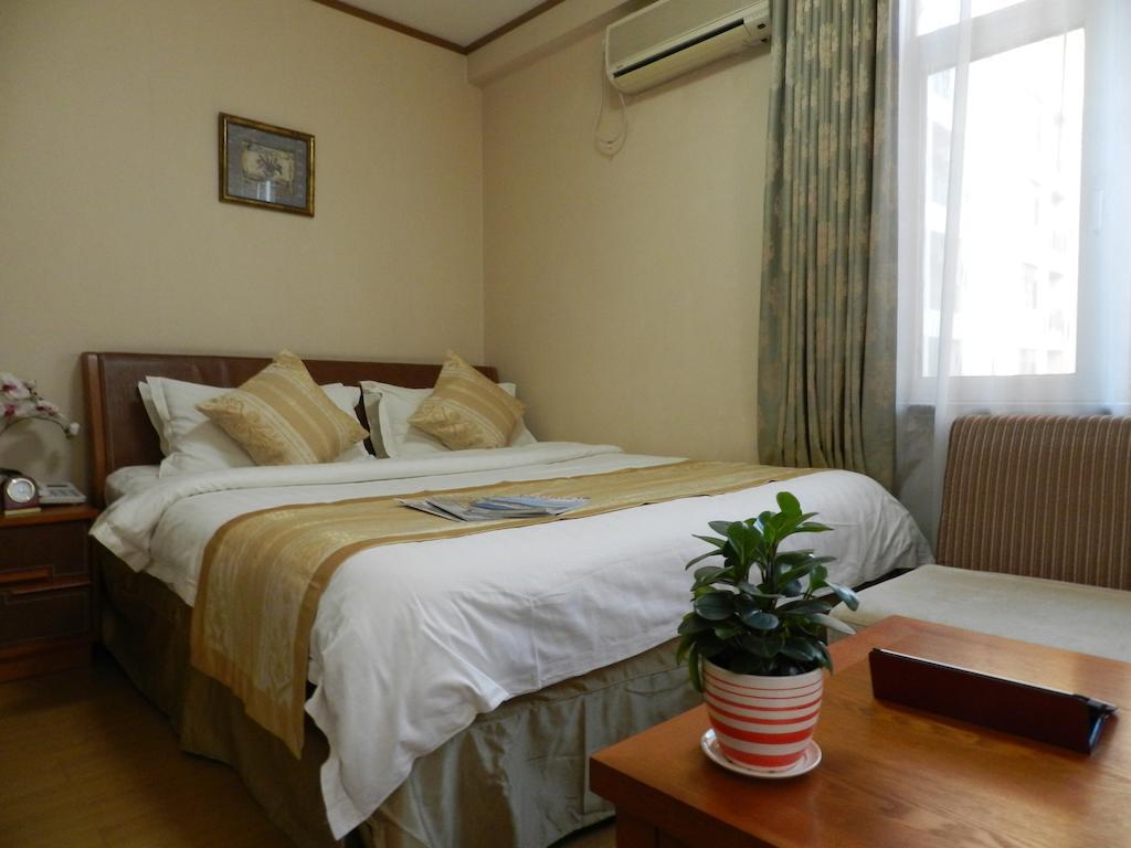 Citadines Gugeng Dalian Quarto foto