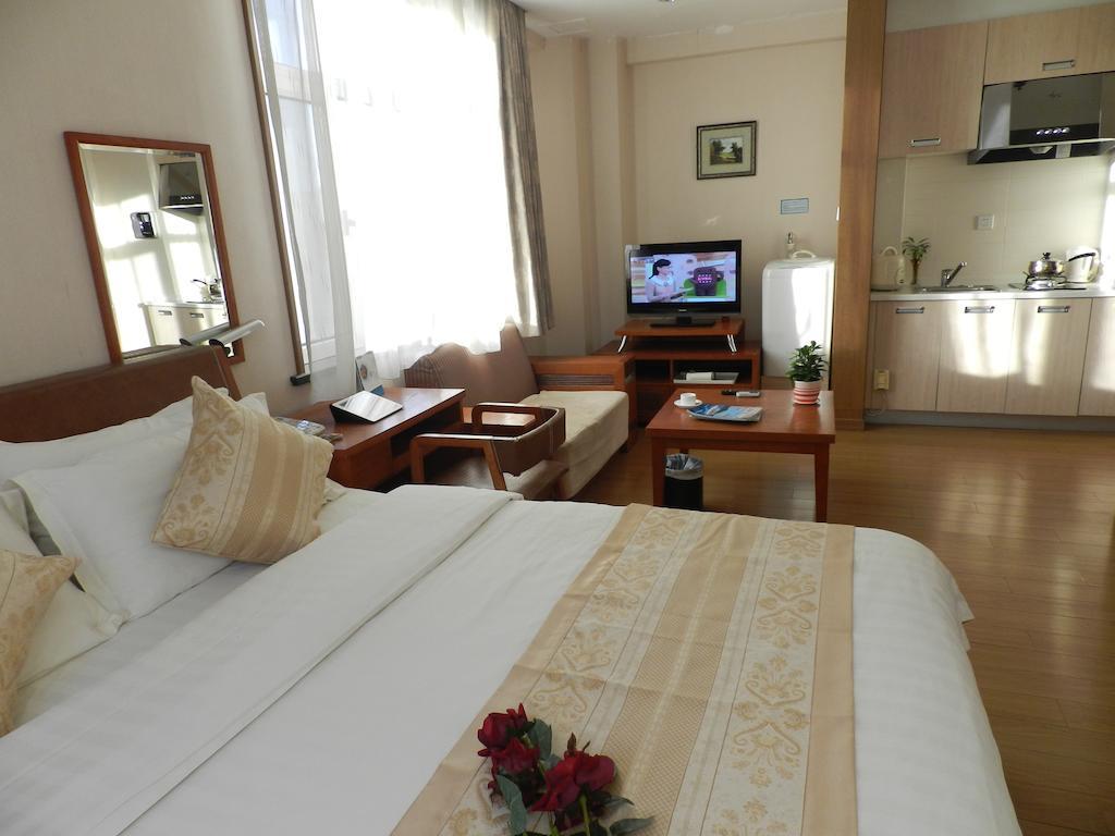 Citadines Gugeng Dalian Quarto foto