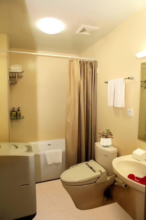 Citadines Gugeng Dalian Quarto foto