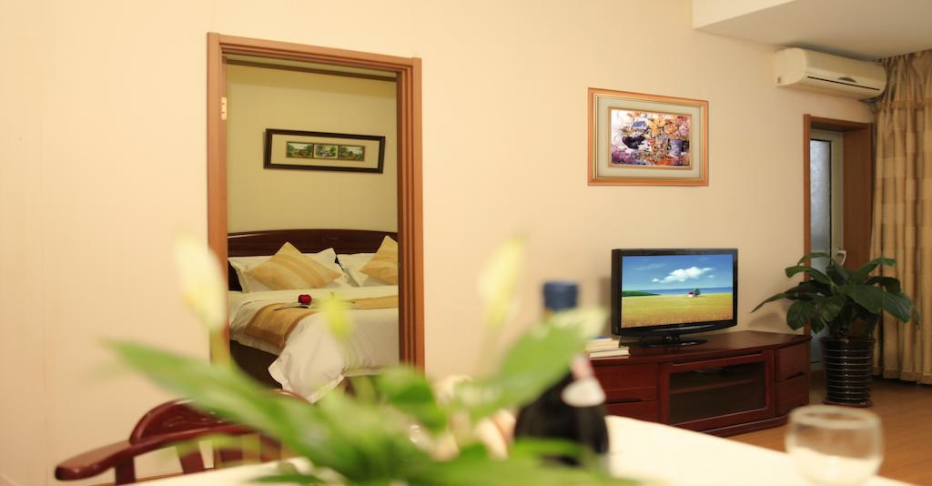 Citadines Gugeng Dalian Quarto foto